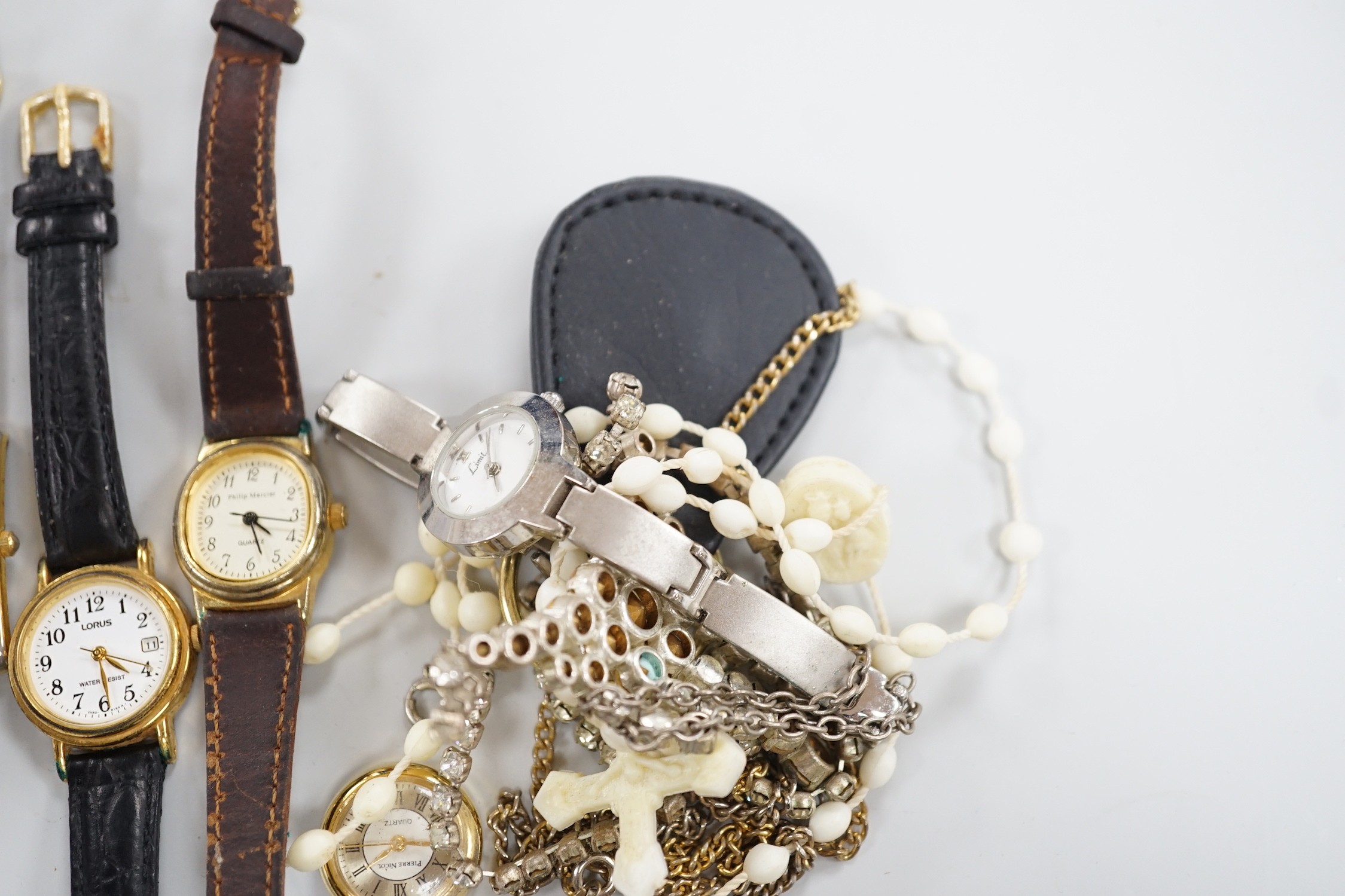 A small quantity of assorted costume jewellery and wrist watches.